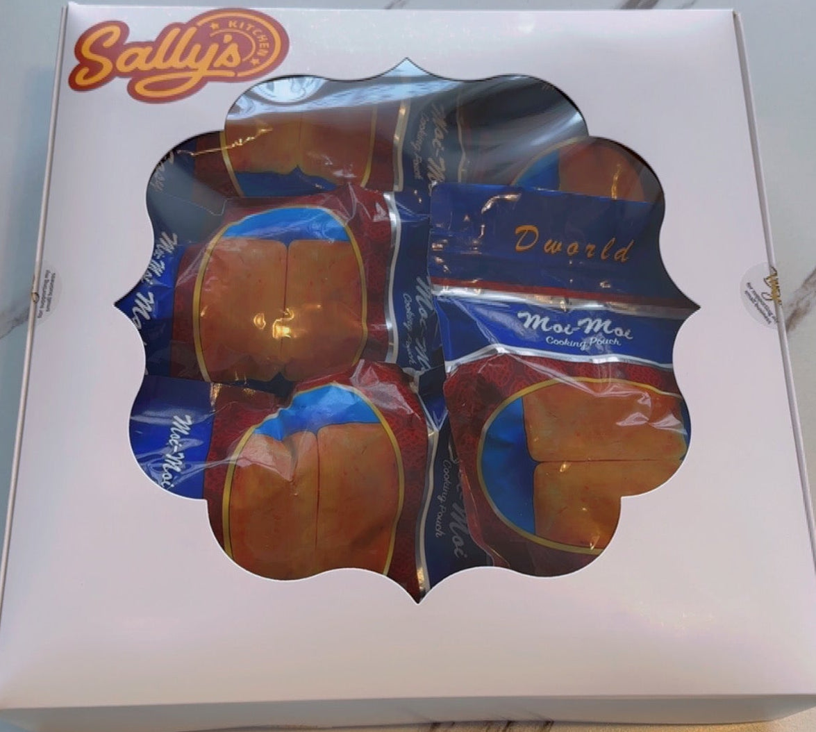 Box of Sally's moi moi on a marble surface
